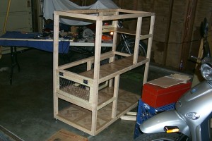 Another view of the cat cage with added door